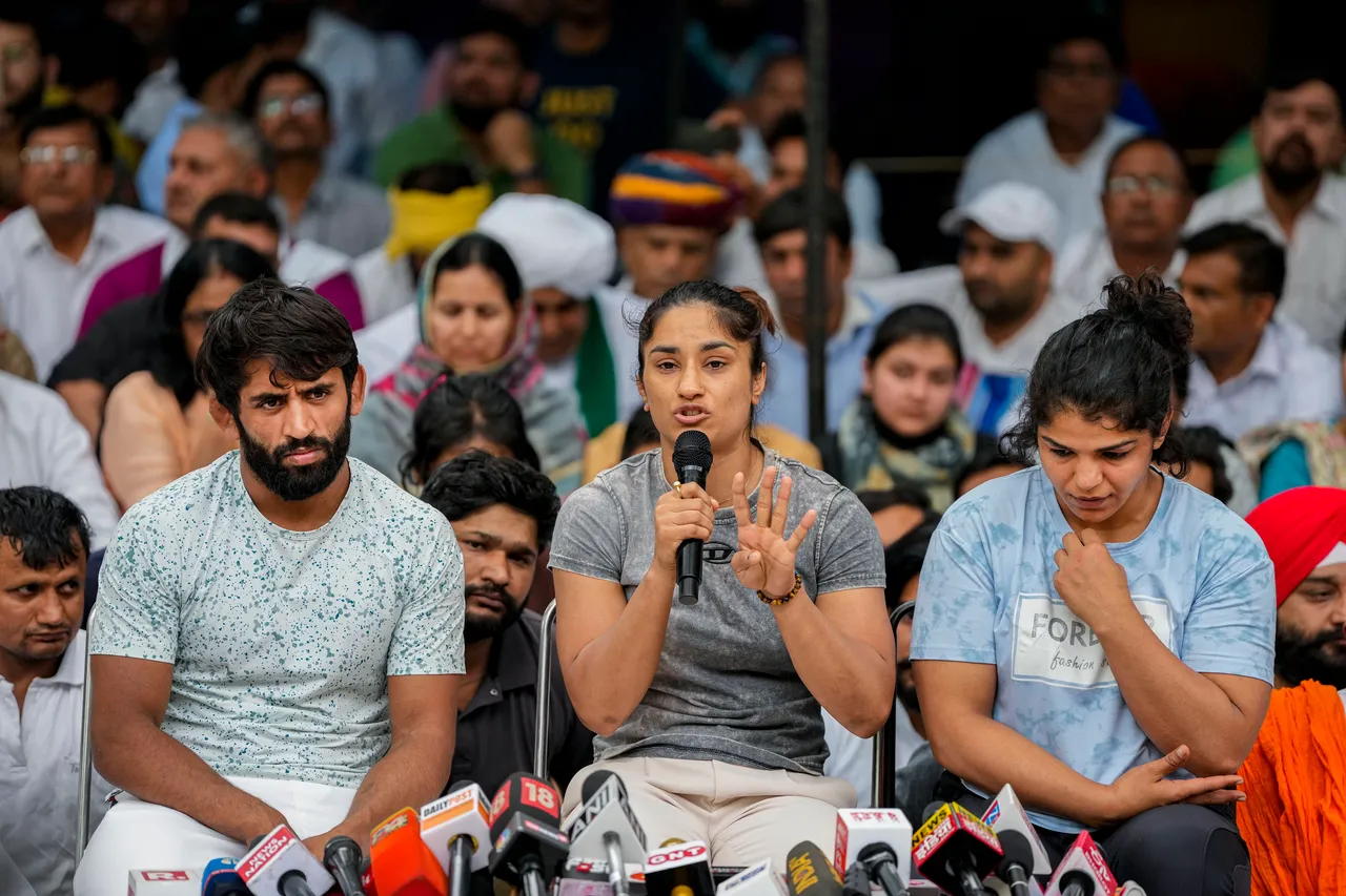 Wrestlers Bajrang Punia, Vinesh Phogat and Sakshi Malik speak with the media during their protest at Jantar Mantar, in New Delhi