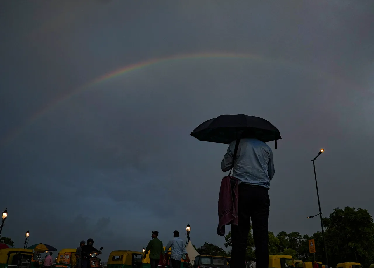 A rainbow appears after monsoon rain in New Delhi
