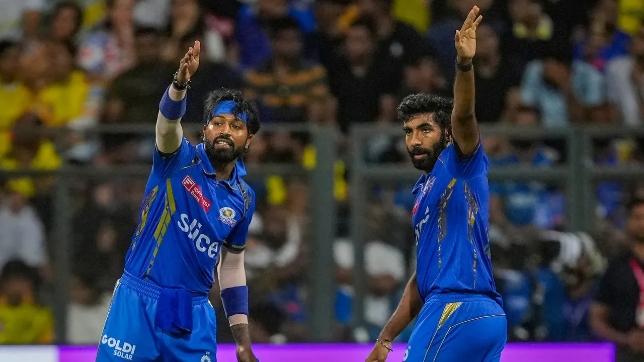 Mumbai Indians bowler Jasprit Bumrah with captain Hardik Pandya during the Indian Premier League (IPL) cricket match between Chennai Super Kings and Mumbai Indians, at Wankhede Stadium in Mumbai, Sunday, April 14, 2024