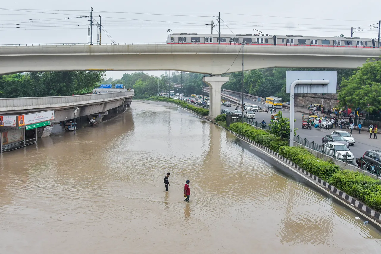 A flooded road near ISBT as the swollen Yamuna river floods low-lying areas, in New Delhi, Thursday