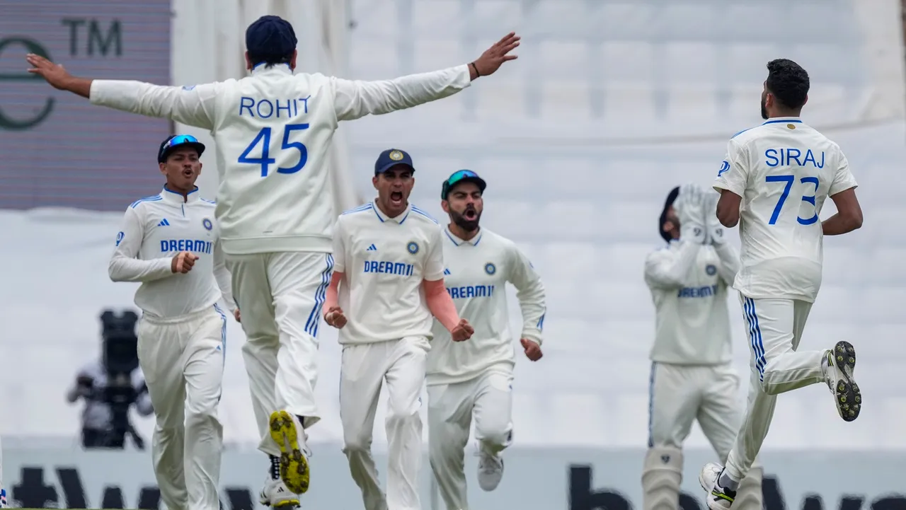Mohammed Siraj celebrates with the teammates after taking the wicket of South Africa's Aiden Markram