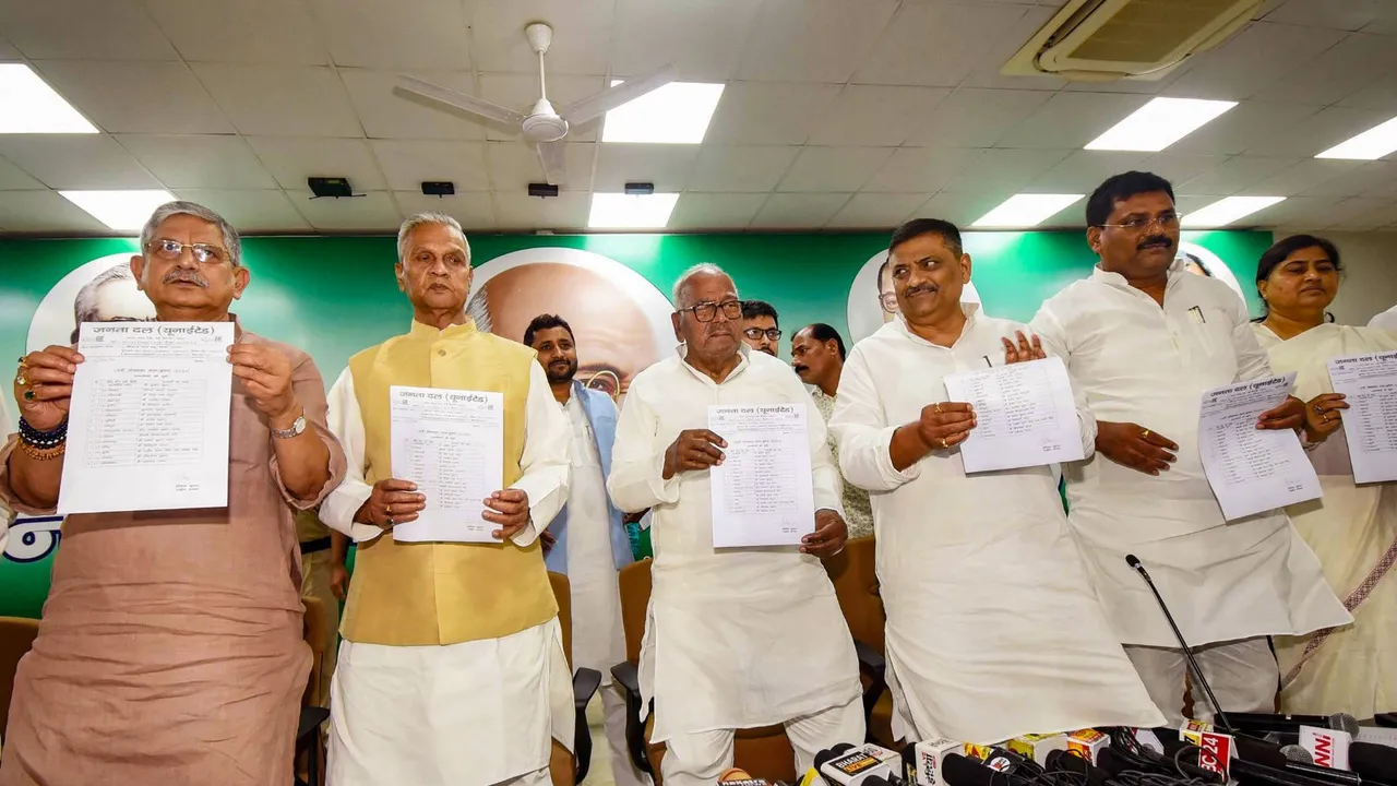 Janata Dal-United (JD-U) senior leader Bashistha Narain Singh with party leaders Lalan Singh, Umesh Kushwaha and others releases party candidates' list