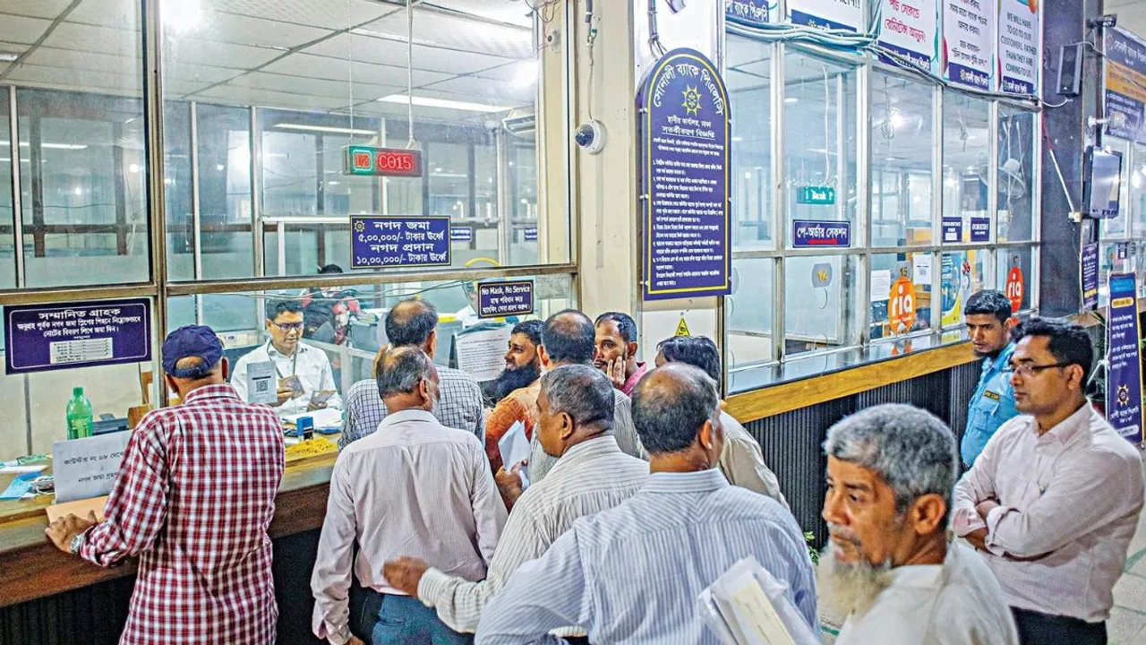 People crowd the Motijheel branch of Sonali Bank on Thursday