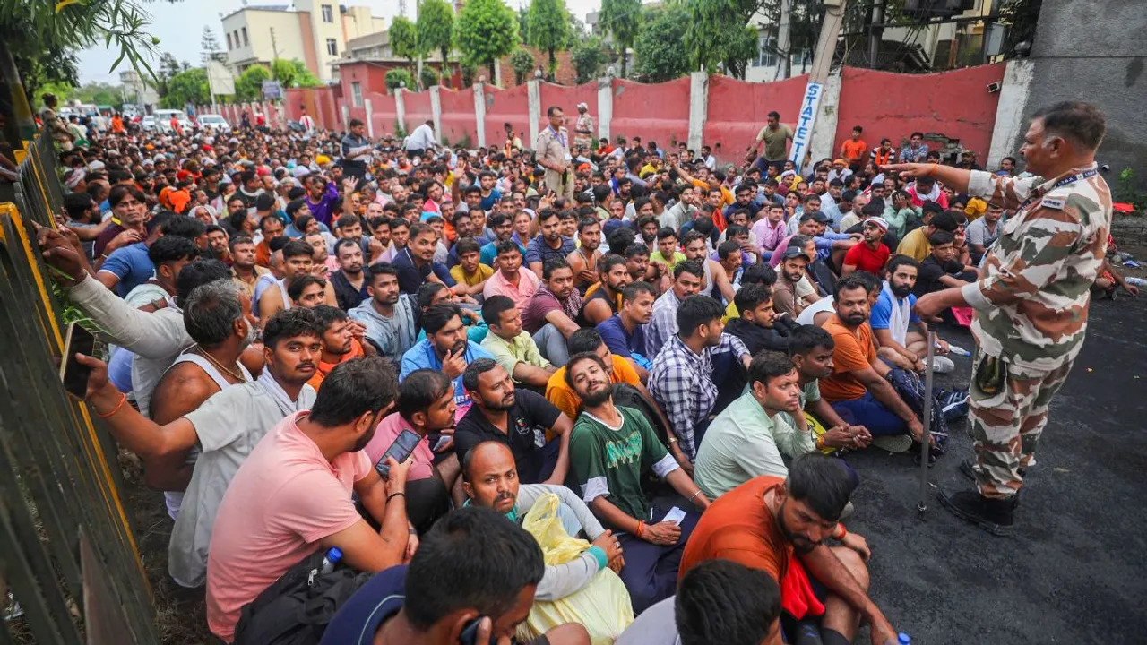 Pilgrims wait to get themselves registered for the annual Amarnath Yatra, in Jammu, Tuesday, July 2, 2024.