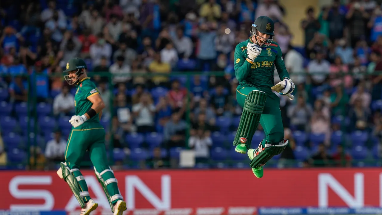 South Africa's batter Rassie Van Der Dussen celebrates his century during the ICC Men's Cricket World Cup