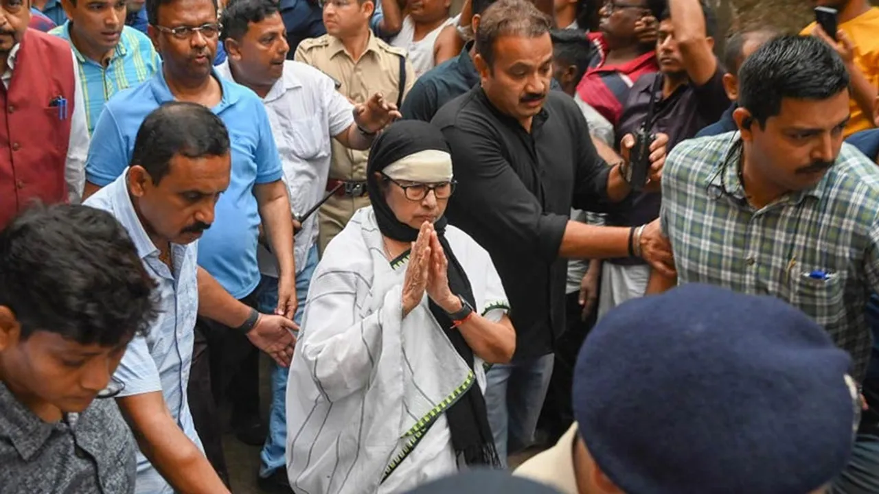West Bengal Chief Minister Mamata Banerjee visits the Garden Reach area where an under-construction building collapsed on Sunday night, in Calcutta