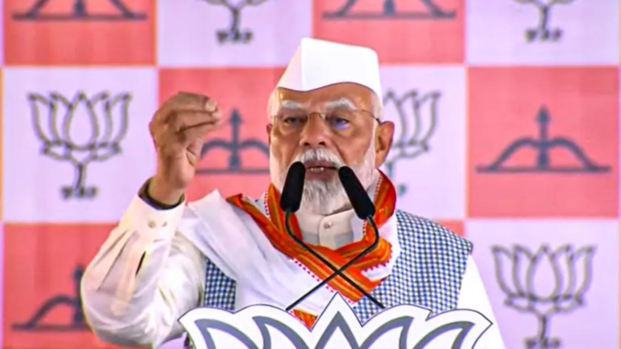 Prime Minister Narendra Modi addresses a public meeting for Lok Sabha elections, in Koderma district, Tuesday, May 14, 2024