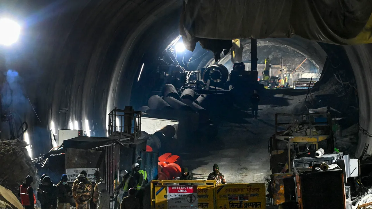 Rescue officials at the entrance of Silkyara Tunnel during the rescue operation of 41 workers trapped inside the under-construction tunnel
