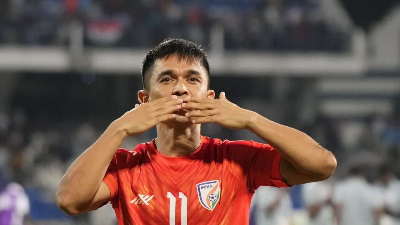 In this Tuesday, July 4, 2023 file photo Indian football team captain Sunil Chhetri acknowledges fans after winning the final football match of SAFF Championship 2023 against Kuwait in Bengaluru