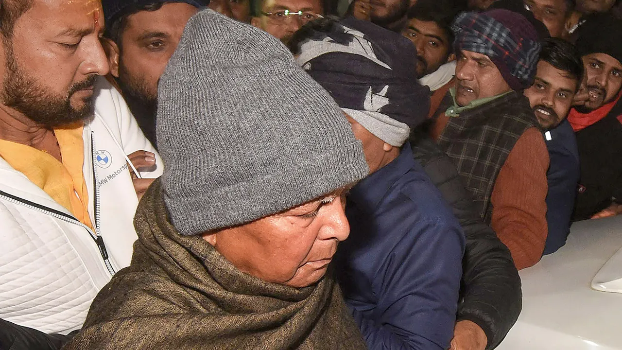 Lalu Prasad Yadav leaves from the Enforcement Directorate (ED) office after being questioned in the land-for-jobs scam case, in Patna, Monday, Jan. 29, 2024.