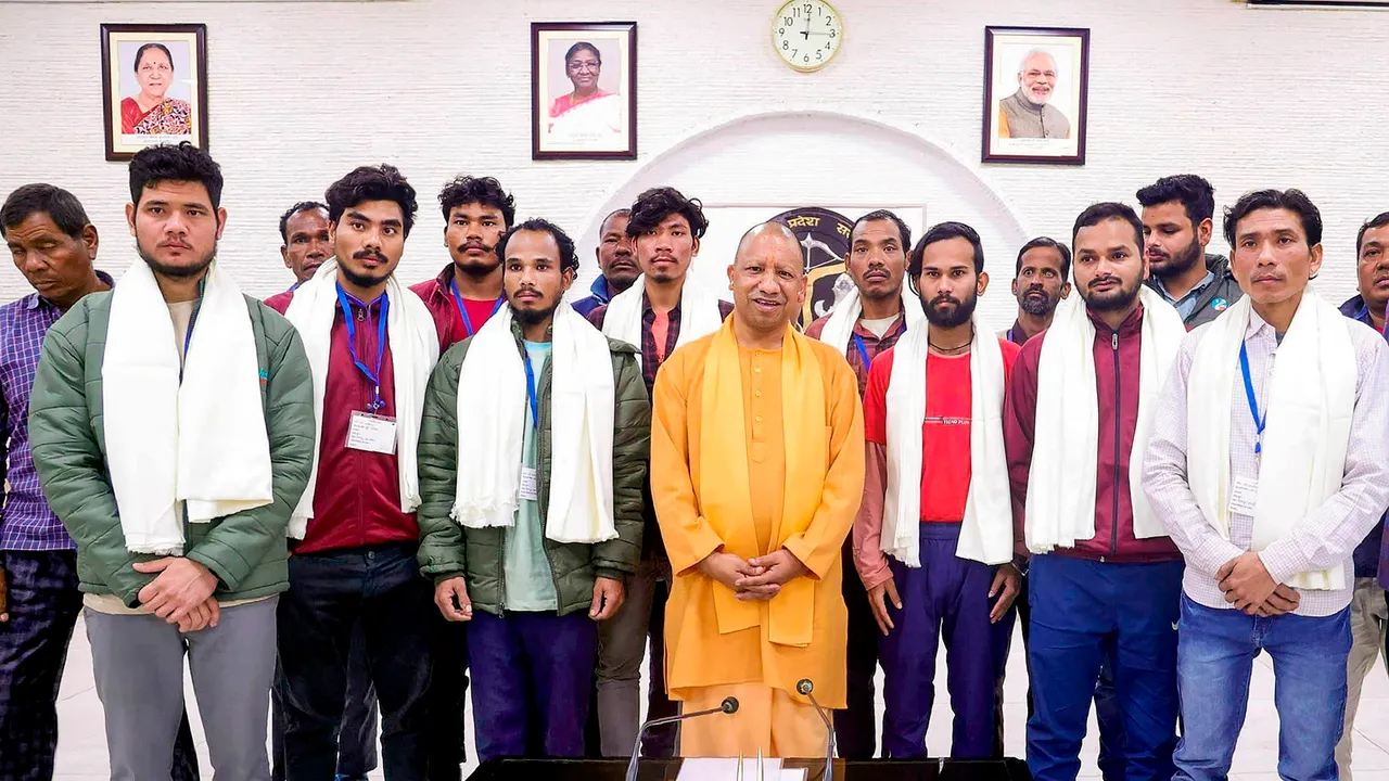 Uttar Pradesh Chief Minister Yogi Adityanath poses for photos with the rescued workers of Uttarakhand’s Silkyara Tunnel, at his official residence in Lucknow