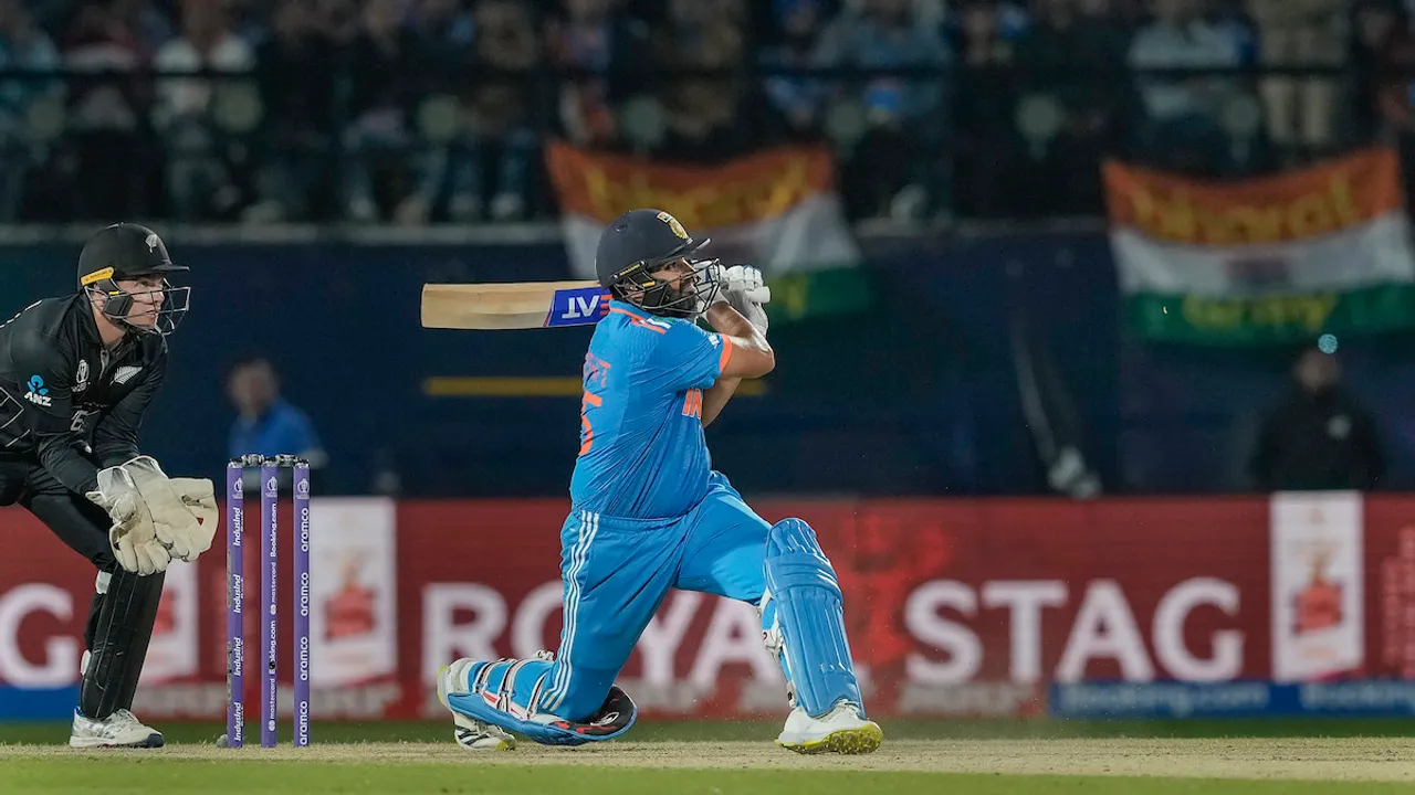 Indian captain Rohit Sharma plays a shot during the ICC Men's World Cup ODI cricket match between India and New Zealand, at HPCA Stadium, Dharamshala, Sunday, Oct. 22, 2023.