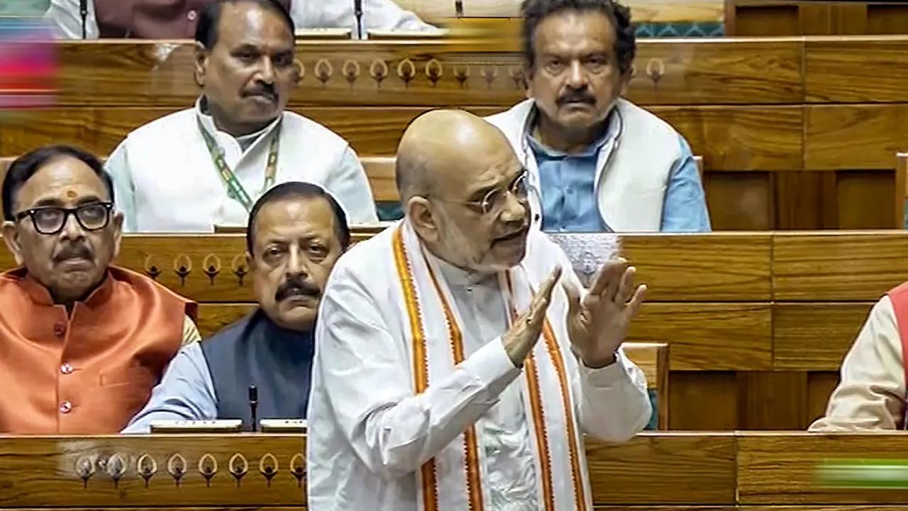 Union Home Minister Amit Shah speaks in the Lok Sabha during a special session of the Parliament, in New Delhi, Tuesday, Sept. 19, 2023.
