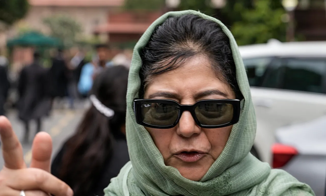 PDP chief Mehbooba Mufti interacts with the media after attending the constitution bench hearing on the abrogation of Article 370 at the Supreme Court complex