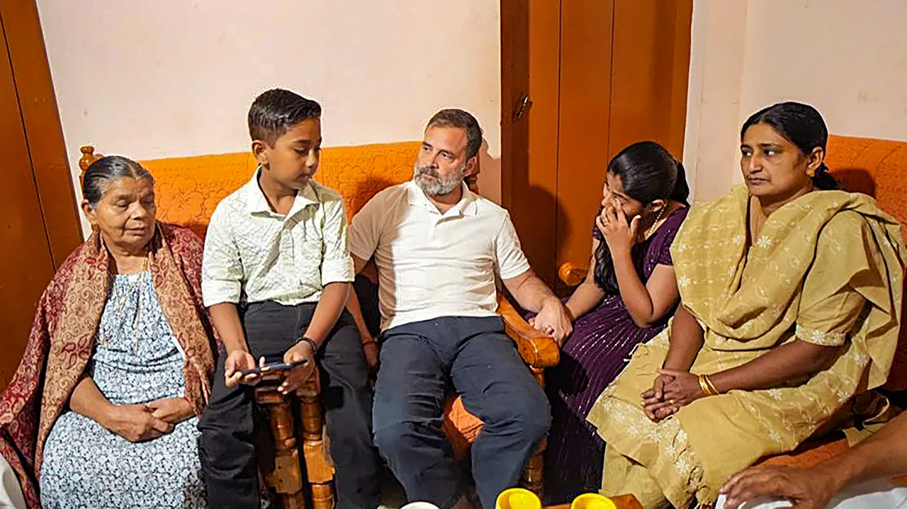 Cogress MP Rahul Gandhi meets the family of Ajeesh, a forest watchman who was killed in an elephant attack, in Wayanad