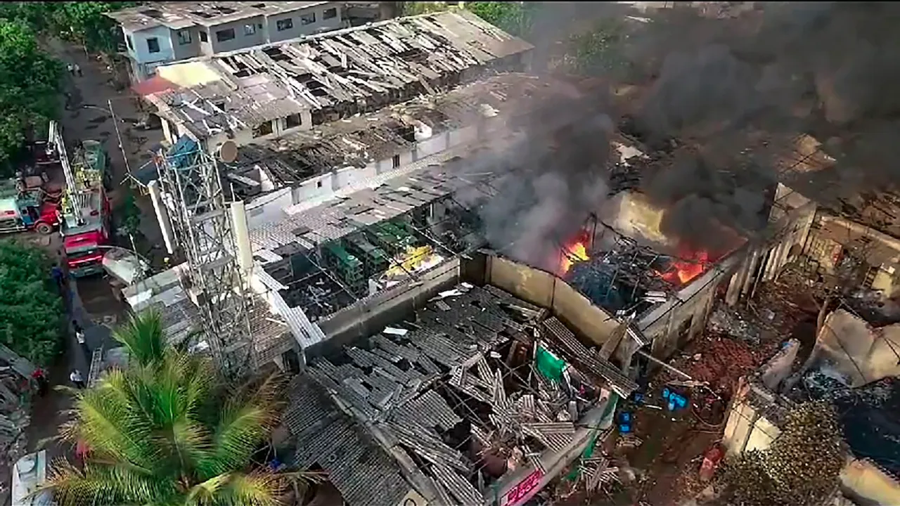 Smoke billows after a fire broke out due to a boiler blast in a chemicals factory, at Dombivli, in Thane district, Thursday, May 23, 2024