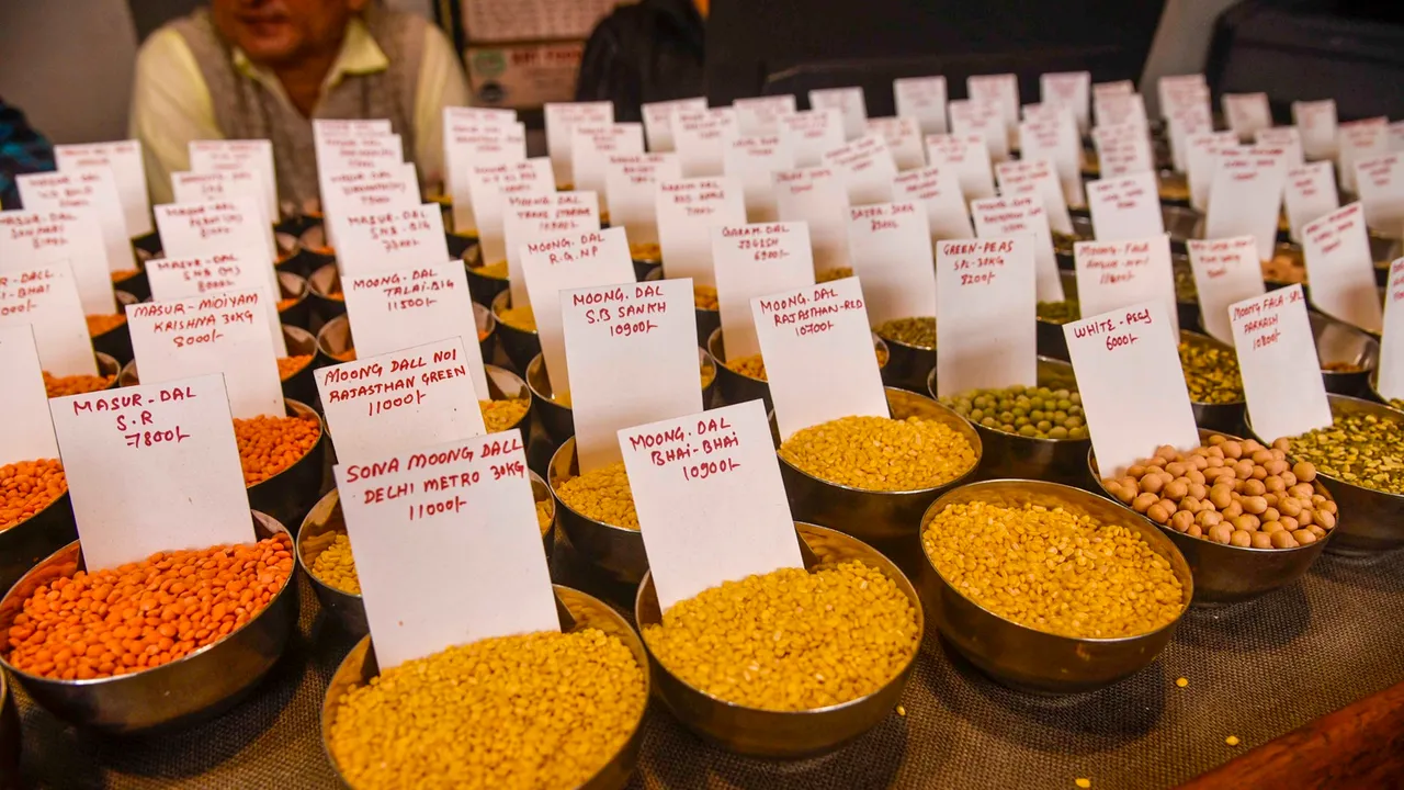 Samples of pulses kept on display inside a shop at a wholesale market ahead of the presentation of the Interim Budget 2024 by Union Finance Minister Nirmala Sitharaman, in Guwahati