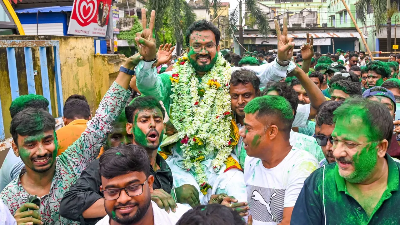 Trinamool Congress (TMC) candidate from Ranaghat South Assembly constituency Mukut Mani Adhikari celebrate after he won the West Bengal Assembly by-elections, in Nadia district, Saturday, July 13, 2024.