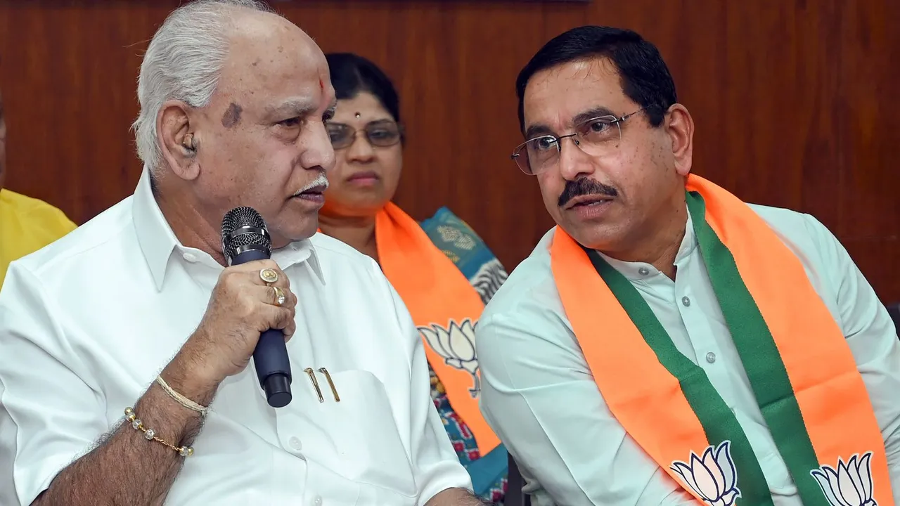 Former Karnataka Chief Minister BS Yediyurappa with Union Minister Pralhad Joshi during a press meet ahead of the Lok Sabha elections, in Hubballi