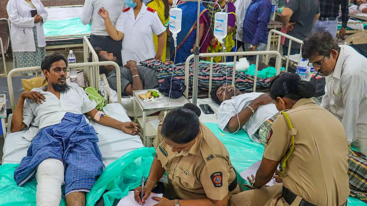 Police personnel take statement of the hoarding collapse victims at a hospital, in Mumbai, Tuesday, May 14, 2024