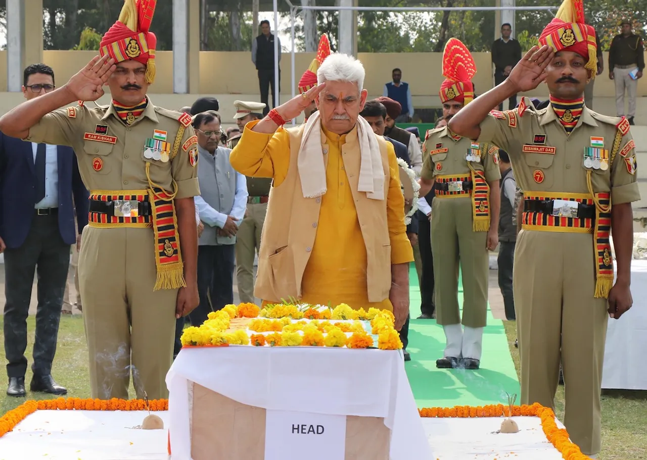  J&K Lieutenant Governor Manoj Sinha pays his last respects to BSF head constable Lal Fam Kima during a wreath laying ceremony at BSF's Paloura Camp in Jammu, Thursday, Nov 9, 2023. Kima was killed in unprovoked firing by Pakistan Rangers along the International Border in Samba district early Thursday.