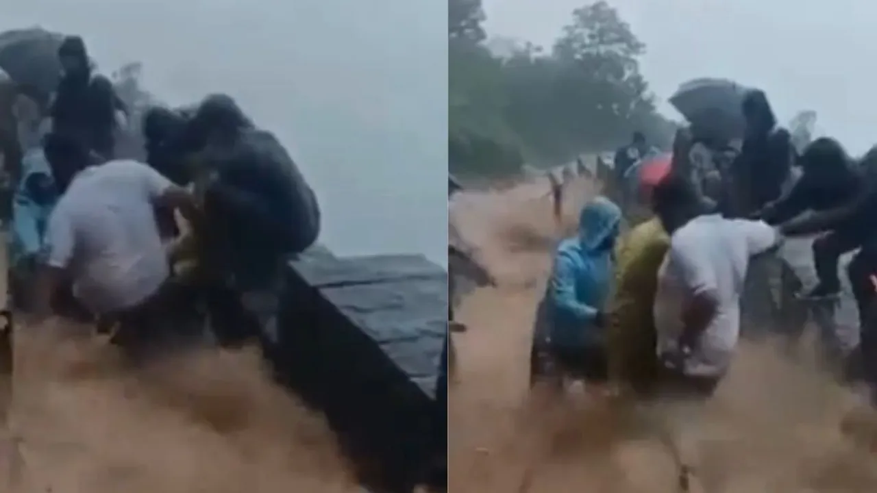 A horrific video from Raigad Fort shows over 30 people stranded due to heavy rainfall causing intense water streams