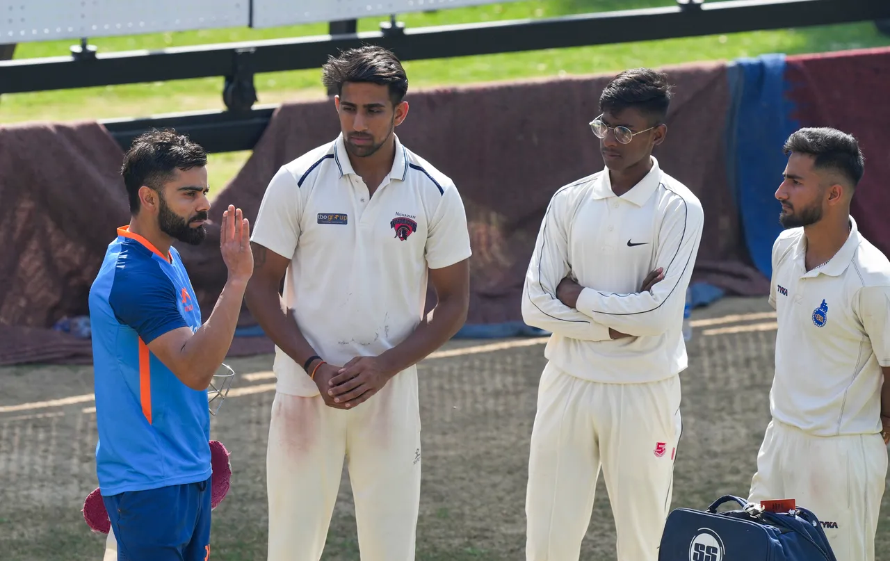Virat Kohli interacts with young cricketers