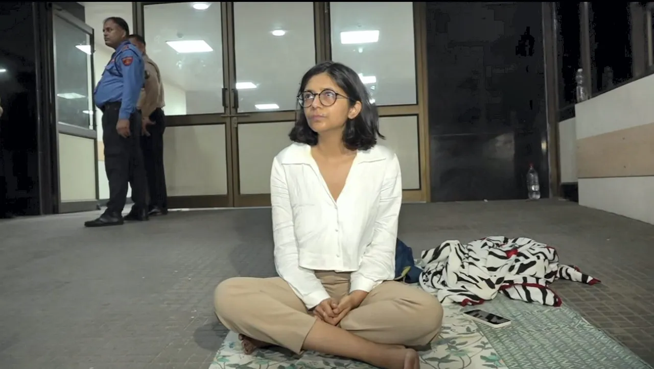Delhi Commission for Women (DCW) Chairperson Swati Maliwal sits outside the hospital where a minor who was allegedly raped by a Delhi government officer is admitted, in New Delhi