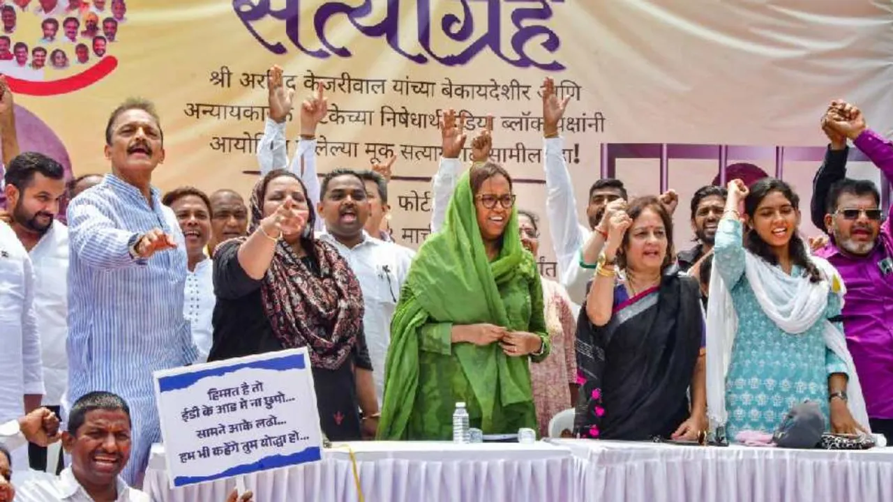 Congress leaders Bhai Jagtap, Varsha Gaikwad, AAP leader Preeti Menon and other INDIA bloc leaders during a protest against the arrest of Delhi Chief Minister Arvind Kejriwal, at Azad Maidan