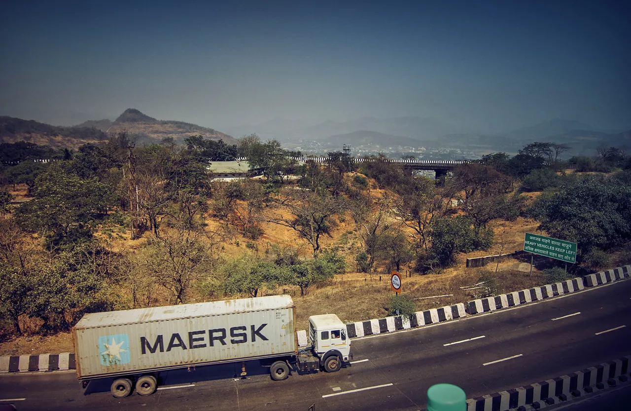 A truck of integrated logistics firm A.P. Moller – Maersk carries shipment