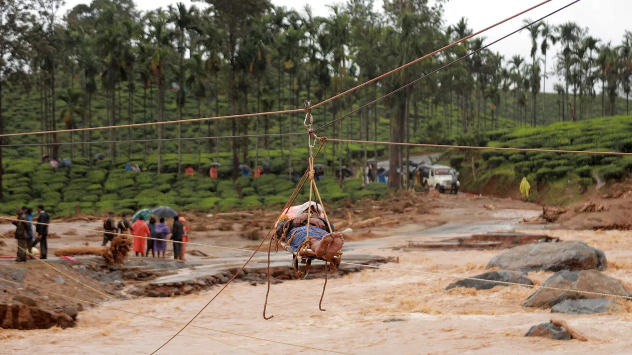 An injured being shifted using ropeway as rescue operation is underway after landslides triggered by heavy monsoon rains, at Chooralmala in Wayanad dristrict, Tuesday, July 30, 2024.