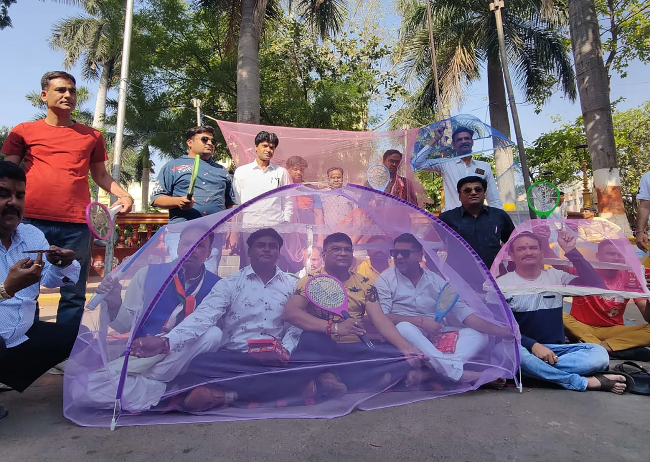 MP: Congress workers stage protest with mosquito nets in Indore