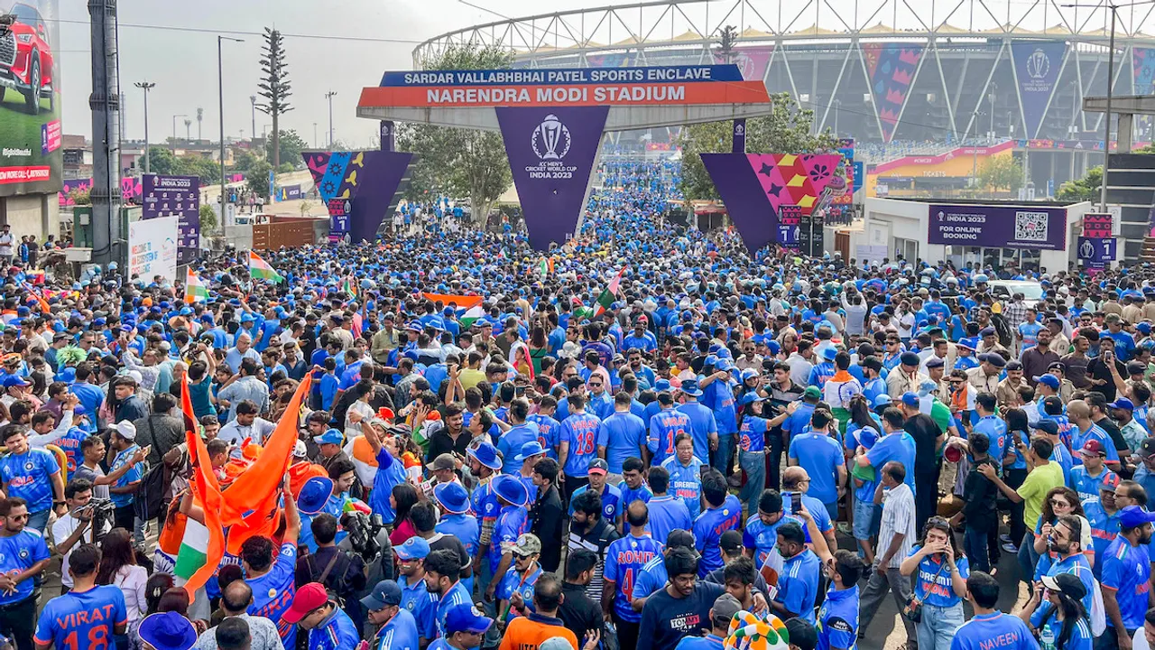 Fans arrive at the Narendra Modi Stadium to watch the ICC Men’s Cricket World Cup 2023 final between India and Australia, in Ahmedabad, Sunday, Nov. 19, 2023.