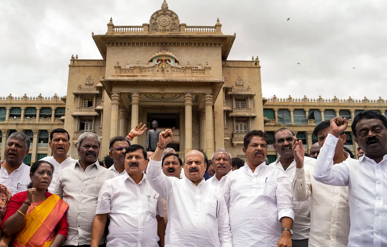 Former Karnataka chief minister and BJP MLA Basavaraj Bommai with party MLAs stages a protest at Vidhana Soudha