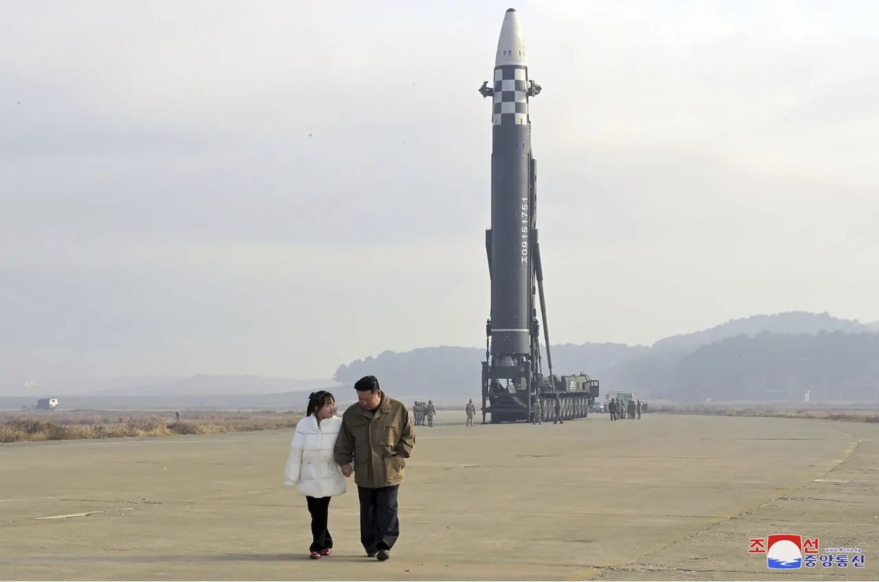 North Korea unveils Kim Jong Un's daughter at missile launch site