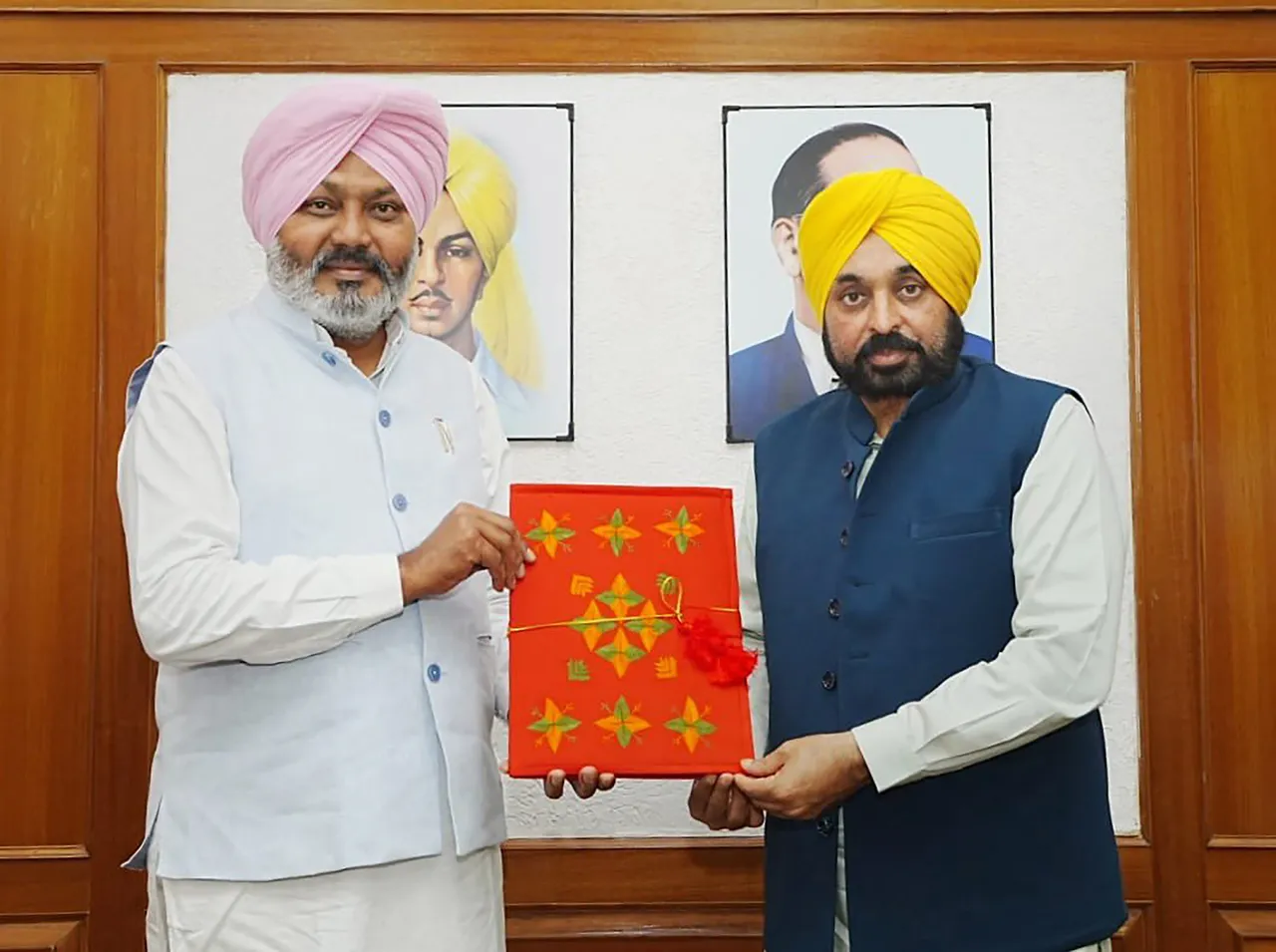 Punjab Chief Minister Bhagwant Mann and Finance Minister Harpal Singh Cheema with Punjab Budget for FY 2023-24 before its presentation in the State Assembly, in Chandigarh