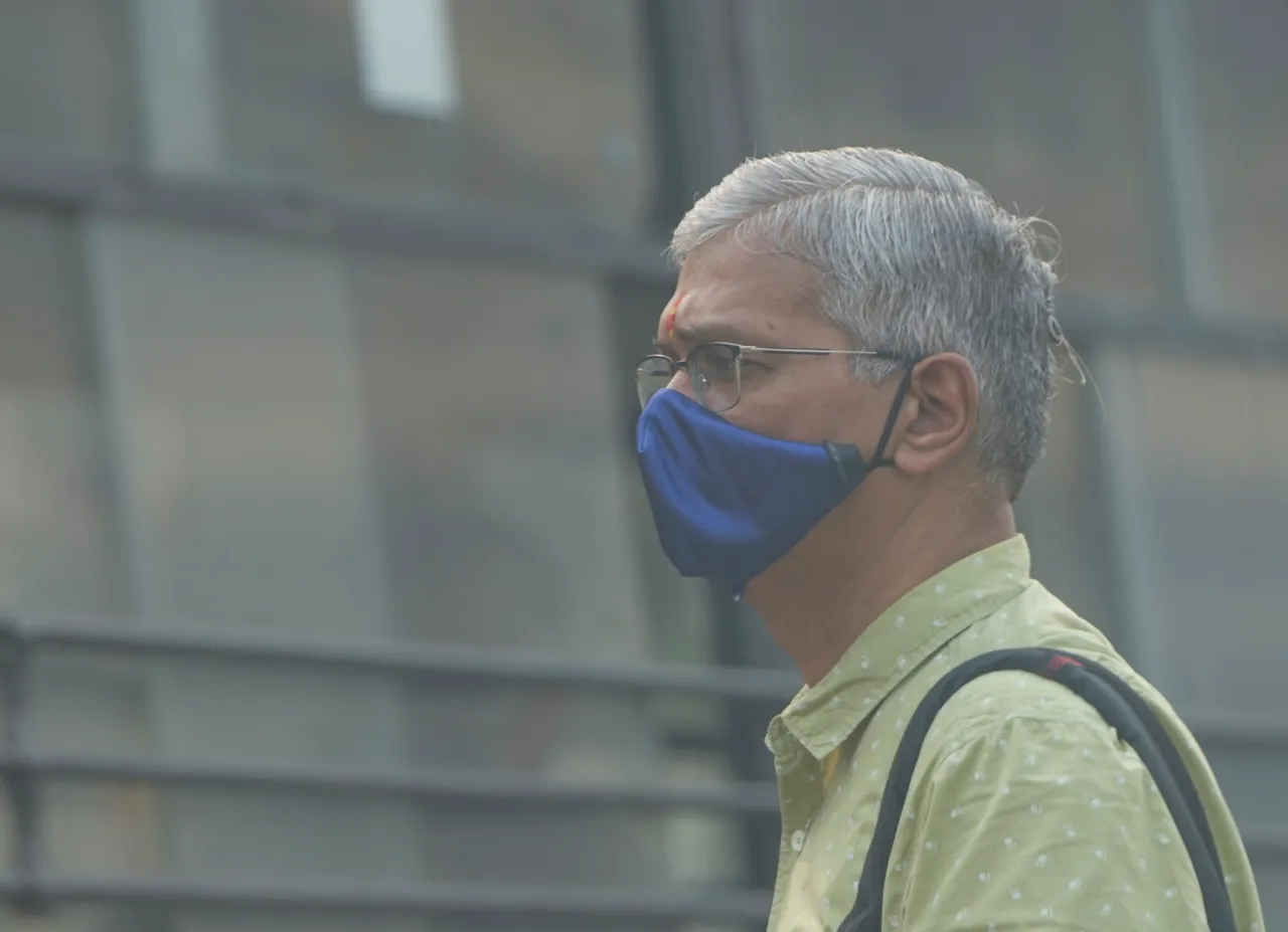A man wears a mask to protect himself from growing level of air pollution, in New Delhi, Thursday, Nov. 2, 2023. While Anand Vihar, Bawana, Mundka and Punjabi Bagh air quality monitoring stations recorded Air Quality Index (AQI) in the severe category, 28 stations recorded very poor AQI.