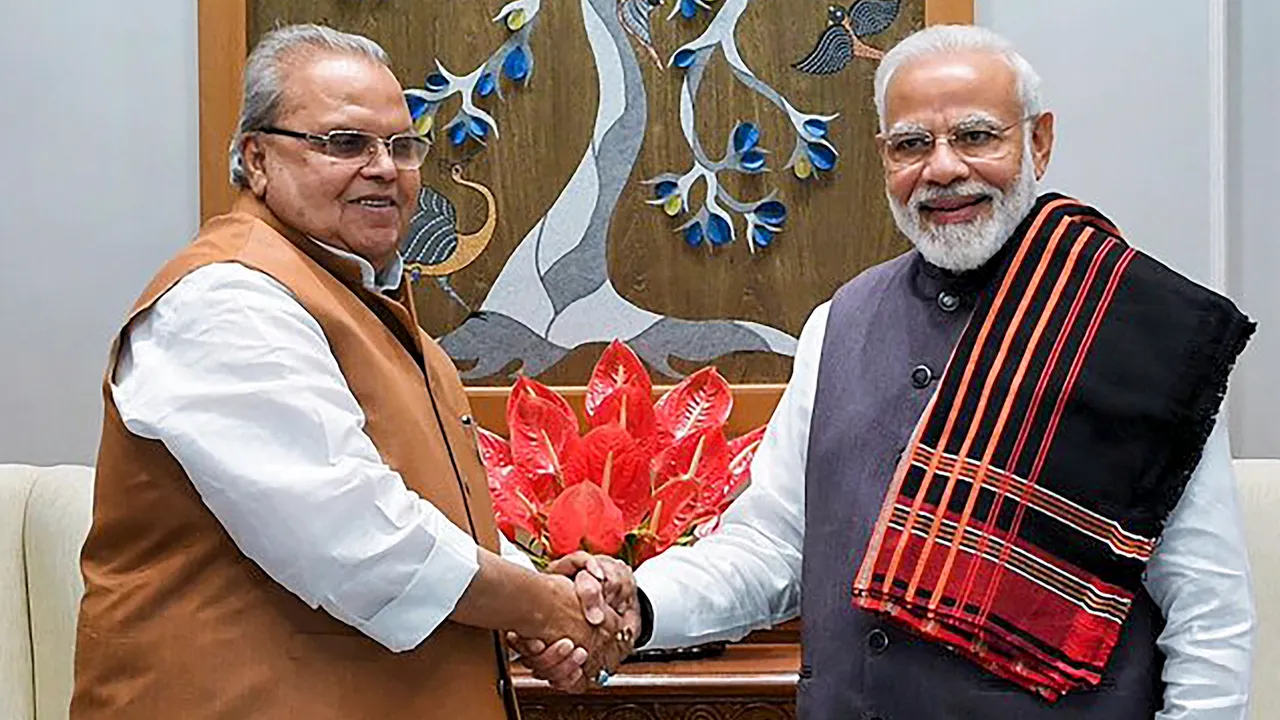  In this Saturday, October 26, 2019 file image, the then Jammu and Kashmir Governor Satya Pal Malik calls on Prime Minister Narendra Modi in New Delhi