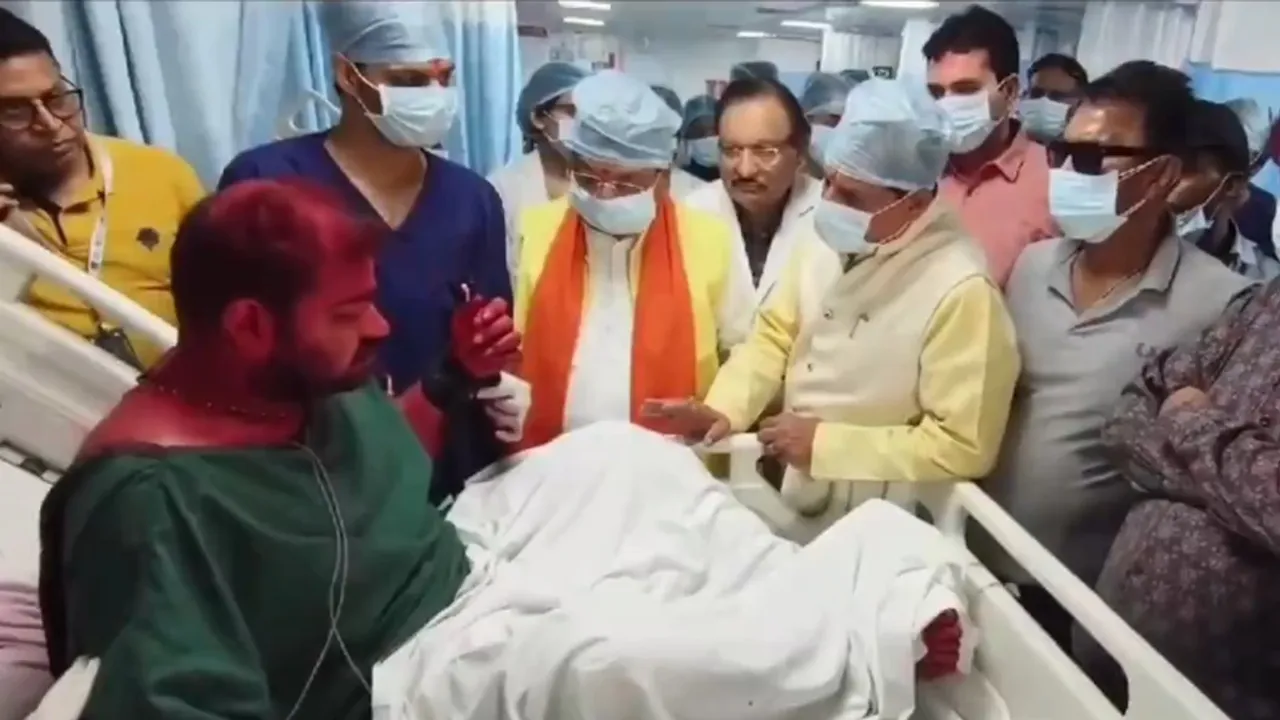 Madhya Pradesh CM Mohan Yadav and state minister Kailash Vijayvargiya meet victims of Ujjain Mahakal Temple fire at a hospital in Indore.
