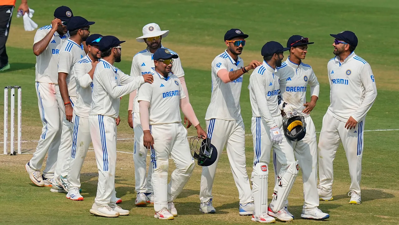 Indian players celebrate after winning the second Test match between India and England