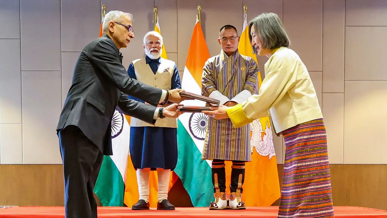 Prime Minister Narendra Modi with Foreign Secretary of India Vinay Mohan Kwatra, Prime Minister of Bhutan Tshering Tobgay and others during the signing and exchanging of several MoUs and agreements, in Thimphu