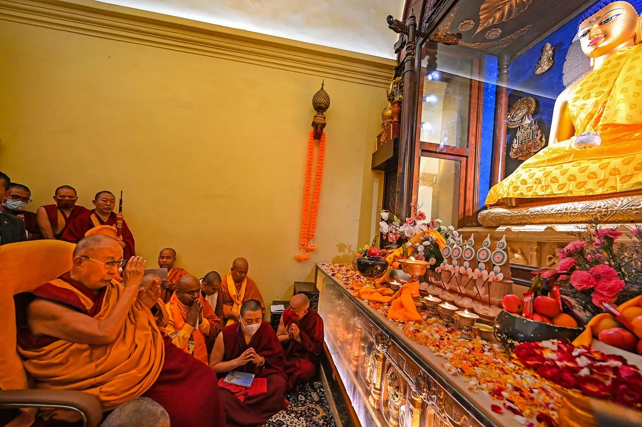 Tibetan spiritual leader the Dalai Lama offers prayers at Mahabodhi temple, in Bodh Gaya