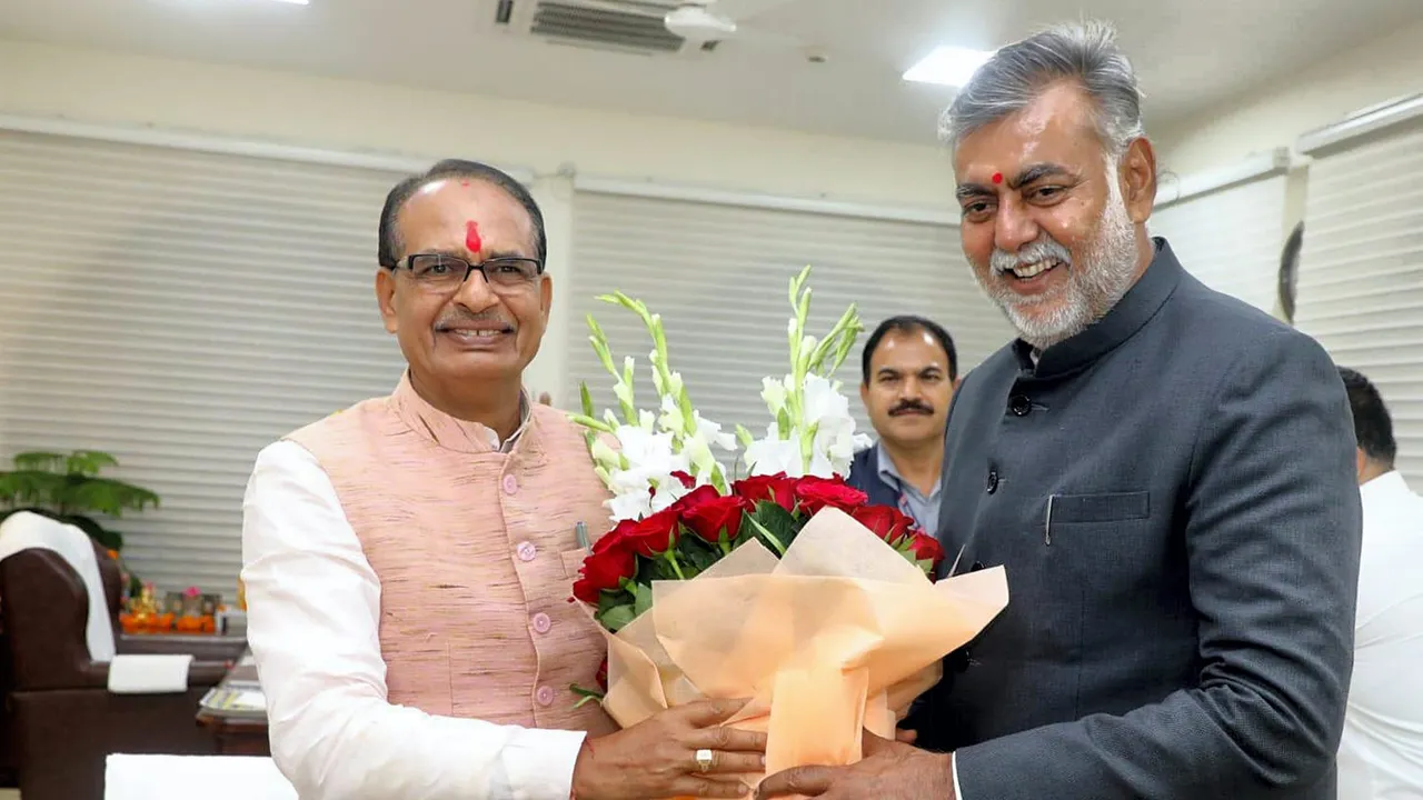 Madhya Pradesh Chief Minister Shivraj Singh Chouhan with former Union Minister and BJP MLA Prahlad Patel during a meeting, in Bhopal