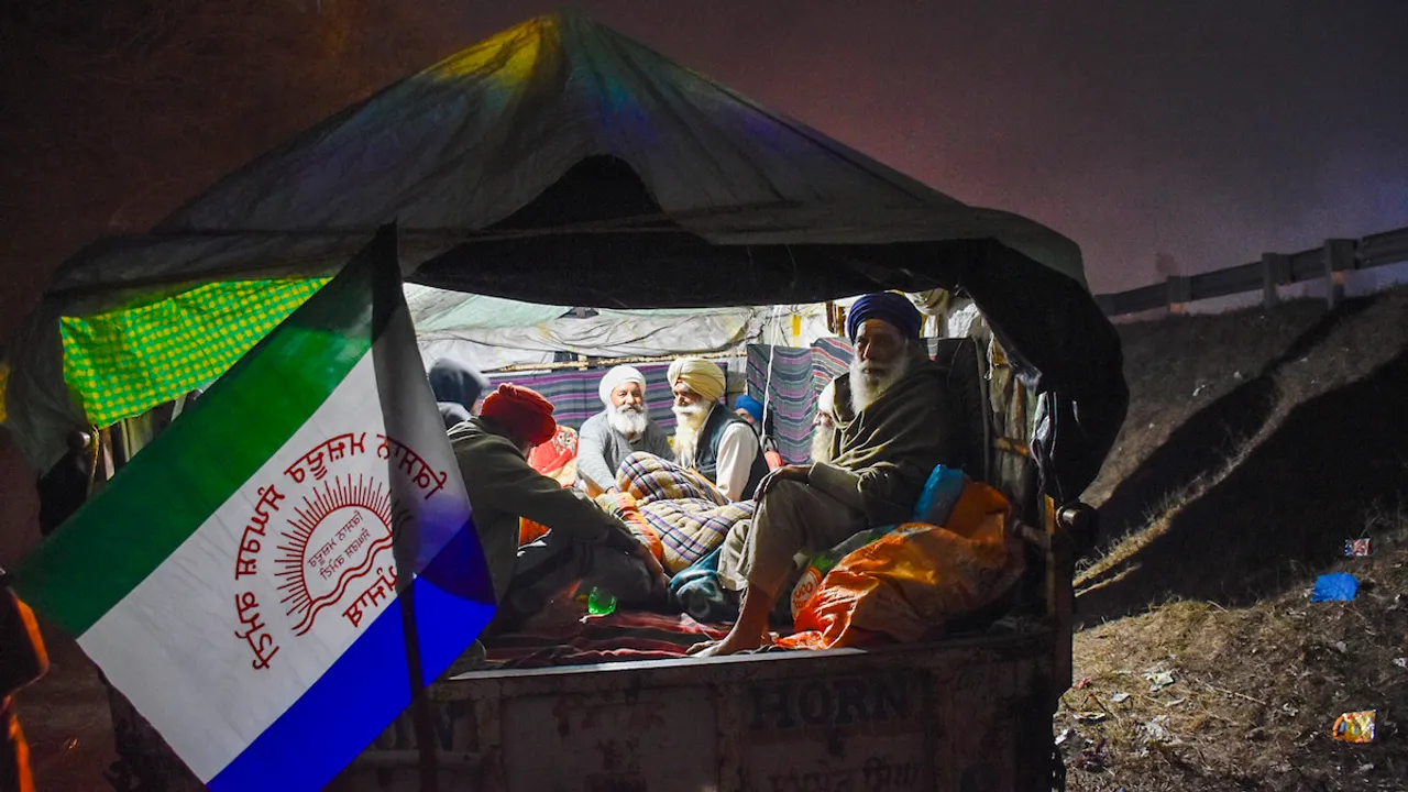 Farmers in a trolley ahead of their scheduled march towards Delhi, in Fatehgarh Sahib, Monday, Feb. 12, 2024.