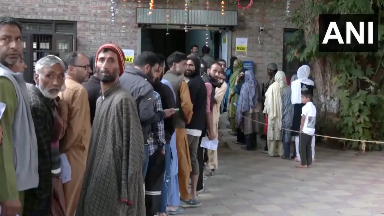 A long queue of voters at a polling booth in Pulwama, as they await their turn to cast a vote.