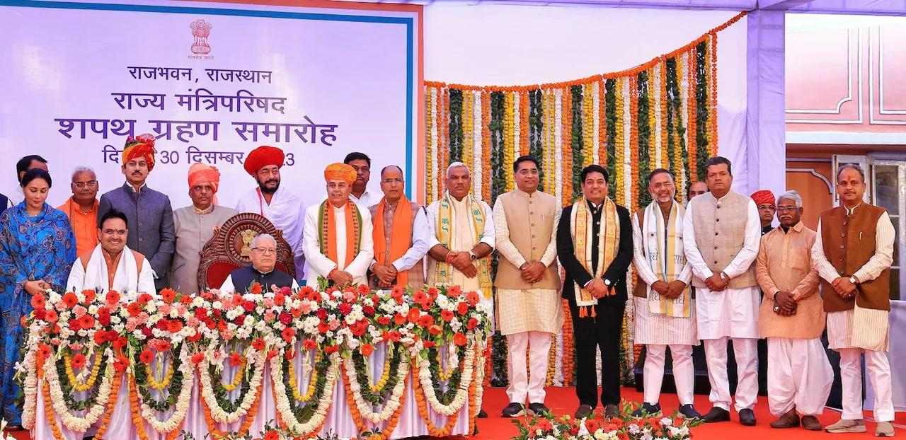 Rajasthan Governor Kalraj Mishra and Chief Minister Bhajan Lal Sharma with the newly-appointed ministers after the oath ceremony, at Raj Bhawan in Jaipur, Dec. 30, 2023.