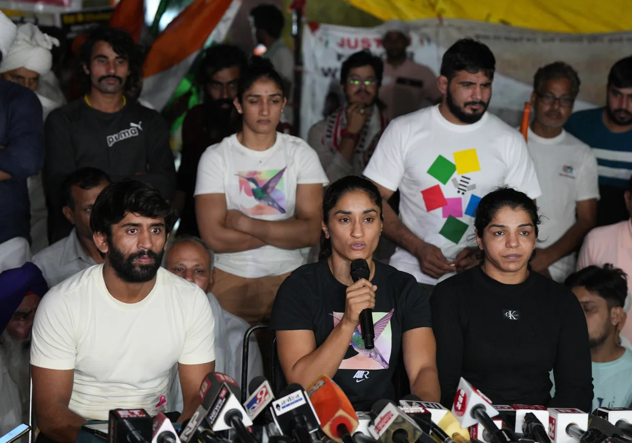 Protesting wrestlers Bajrang Punia, Vinesh Phogat and Sakshi Malik during a press conference, at Jantar Mantar in New Delhi