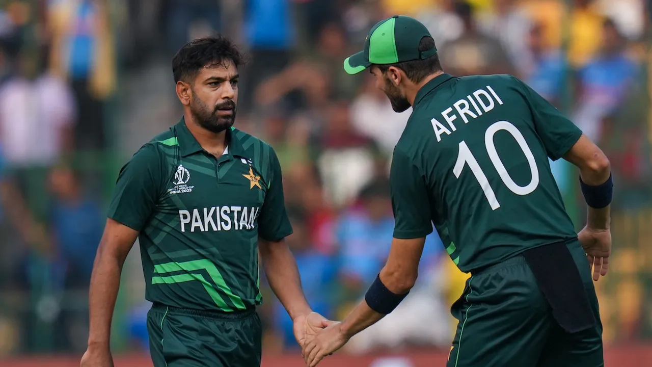 Pakistan's Haris Rauf celebrates with Shaheeh Shah Afridi after taking the wicket of Australia's David Warner during the ICC Men's Cricket World Cup 2023 match between Pakistan and Australia at M. Chinnaswamy Stadium, in Bengaluru, Friday, Oct. 20, 2023.