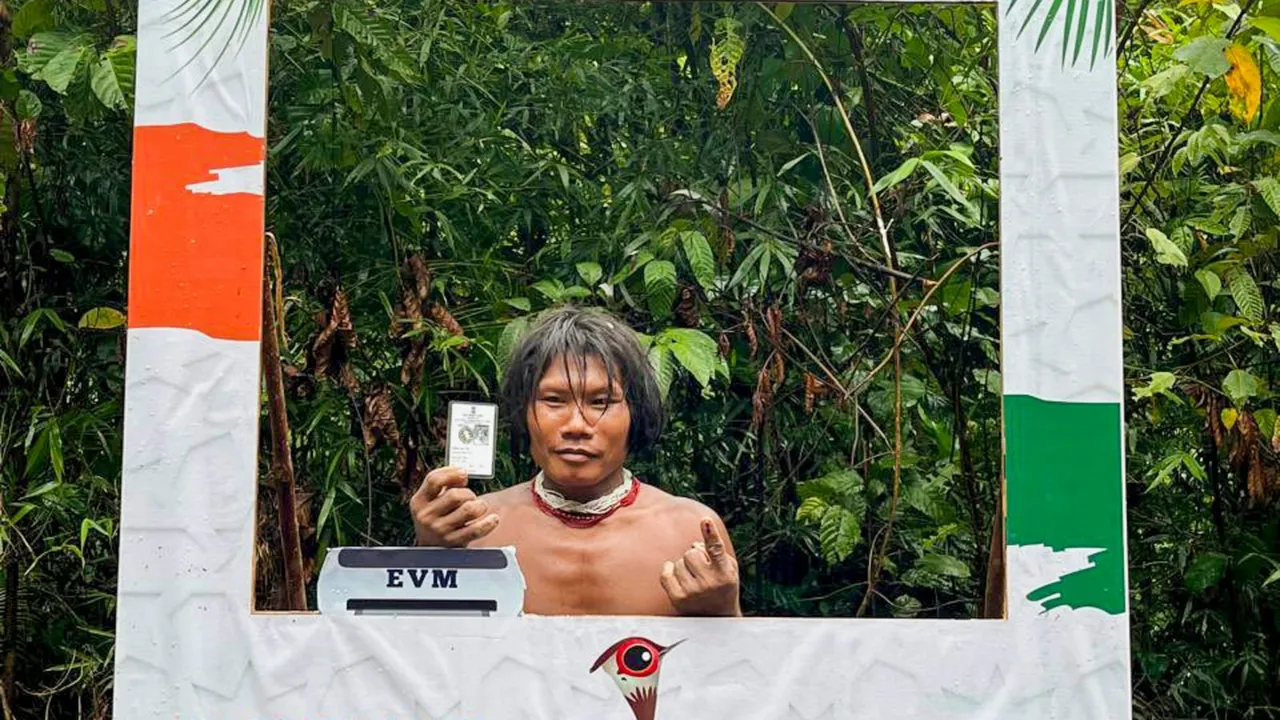 A voter from the Shompen tribal community poses for a photo after casting his vote for the first phase of Lok Sabha�elections in Andaman and Nicobar Island