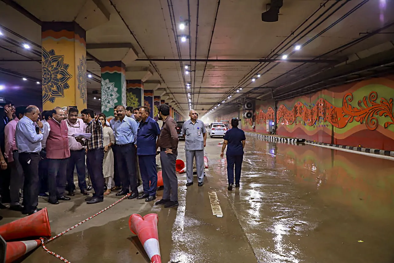 Delhi Lt Governor VK Saxena during the inspection of waterlogging inside Pragati Maidan tunnel after the recent heavy monsoon rains, in New Delhi, Tuesday.jpg
